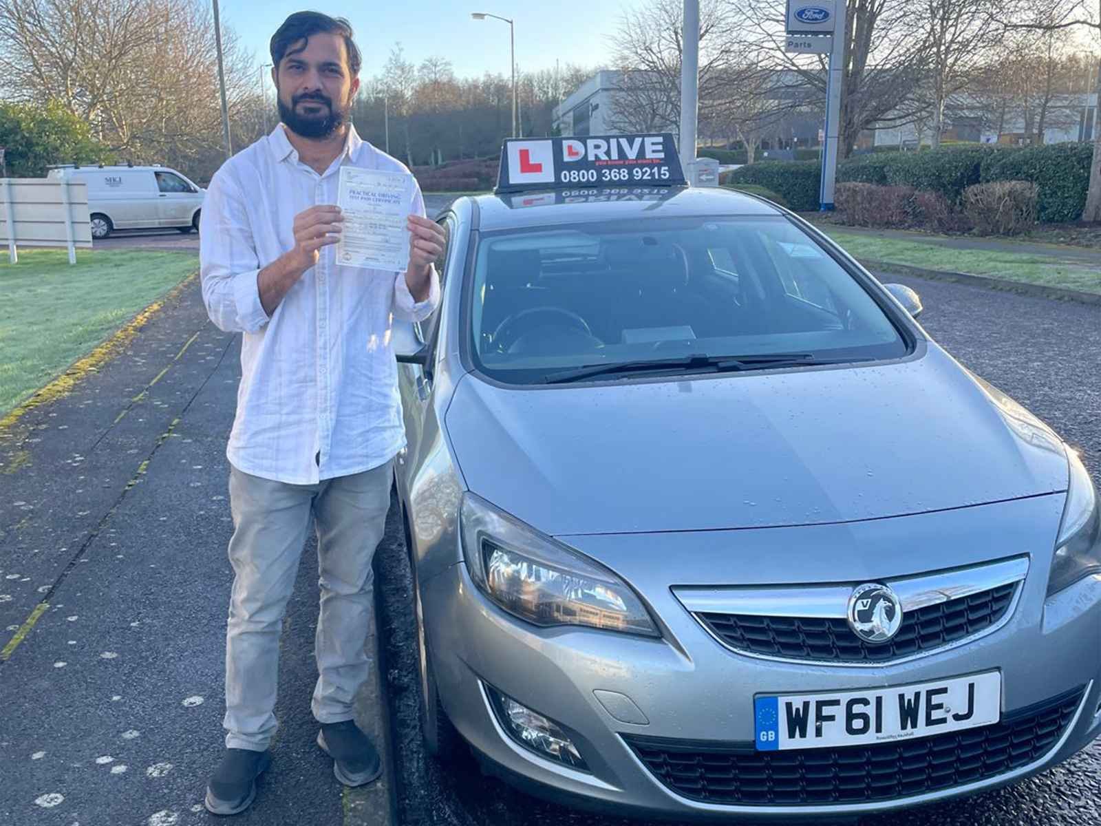 Ashok after passing their driving test with JM Drive
